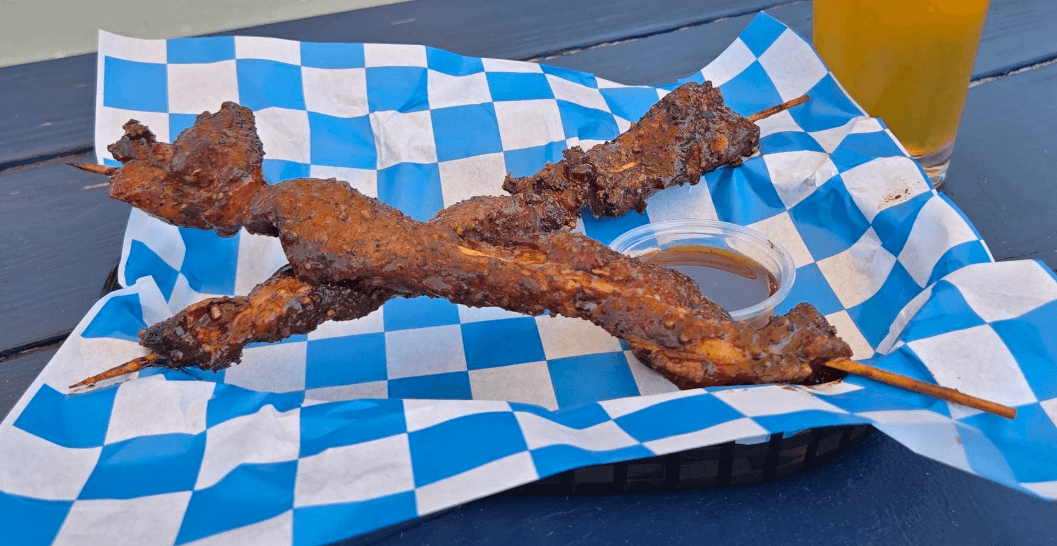 Pork candy skewers with dipping sauce